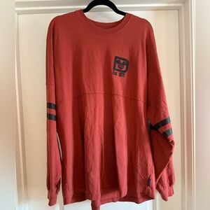 Disney rust orange spirit jersey
